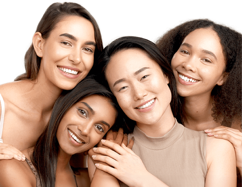 Four women with radiant and healthy skin in different tones