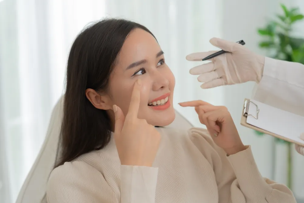 A dermatologist assessing recurring pigmentation